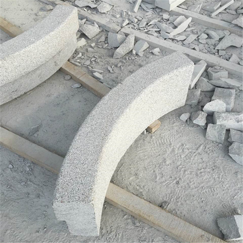 Radius kerbs road safety barriers